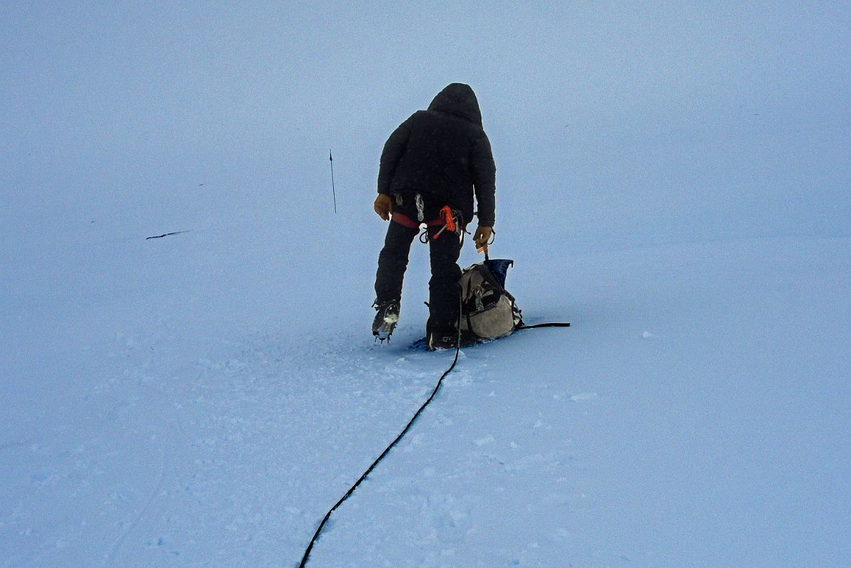 02E Taking A Rest Break In Overcast Weather In The Jacobson Valley On Mount Vinson Summit Day